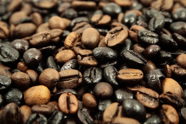 black and light coffee beans after the roasting procedure